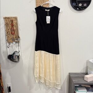 Commense. Elegant Black and Cream Sleeveless Dress